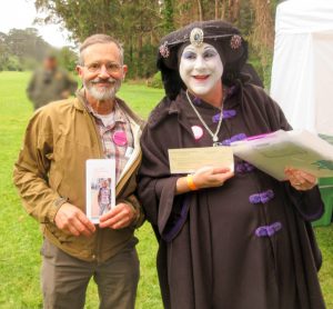 Pete and a Sister showing the donation check